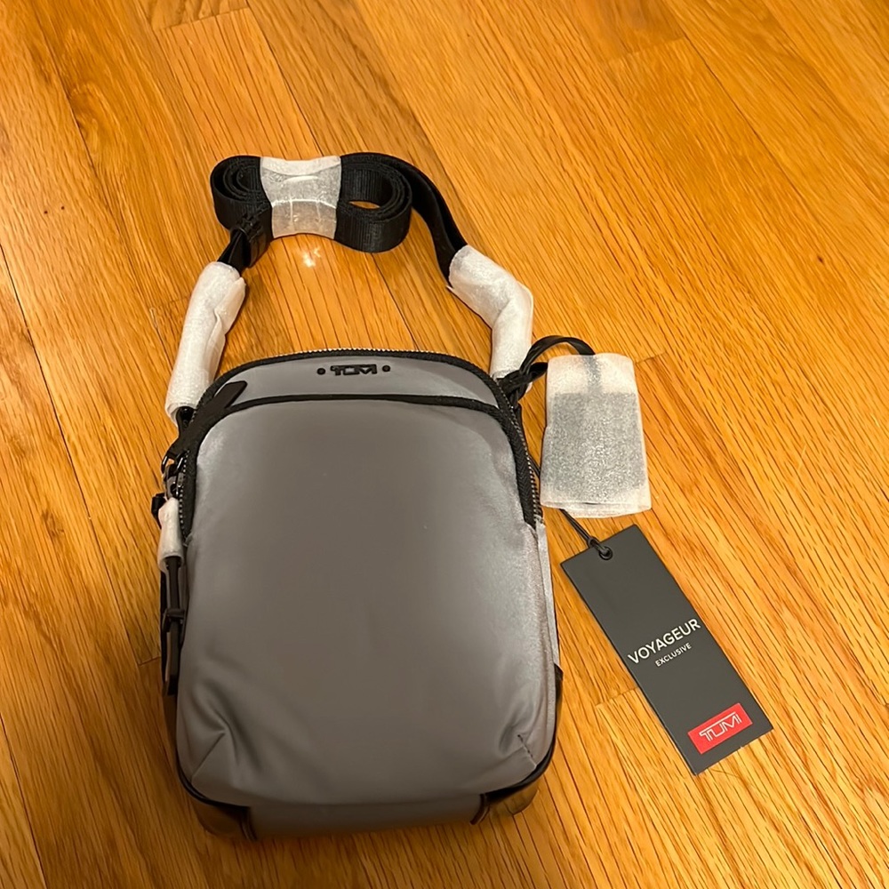 New with tags grey TUMI Voyageur crossbody bag. NWT